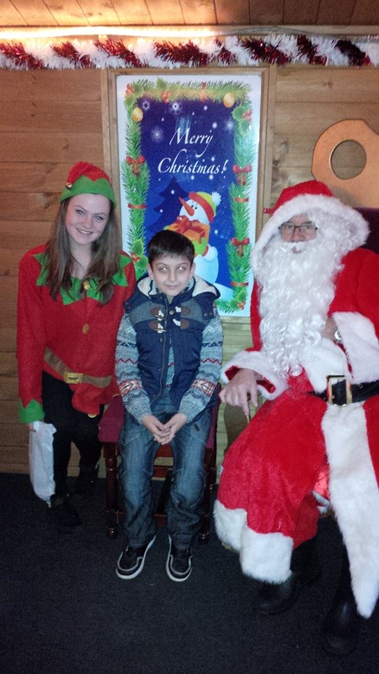 Here's myself, Santa and young Mareks in the grotto! 